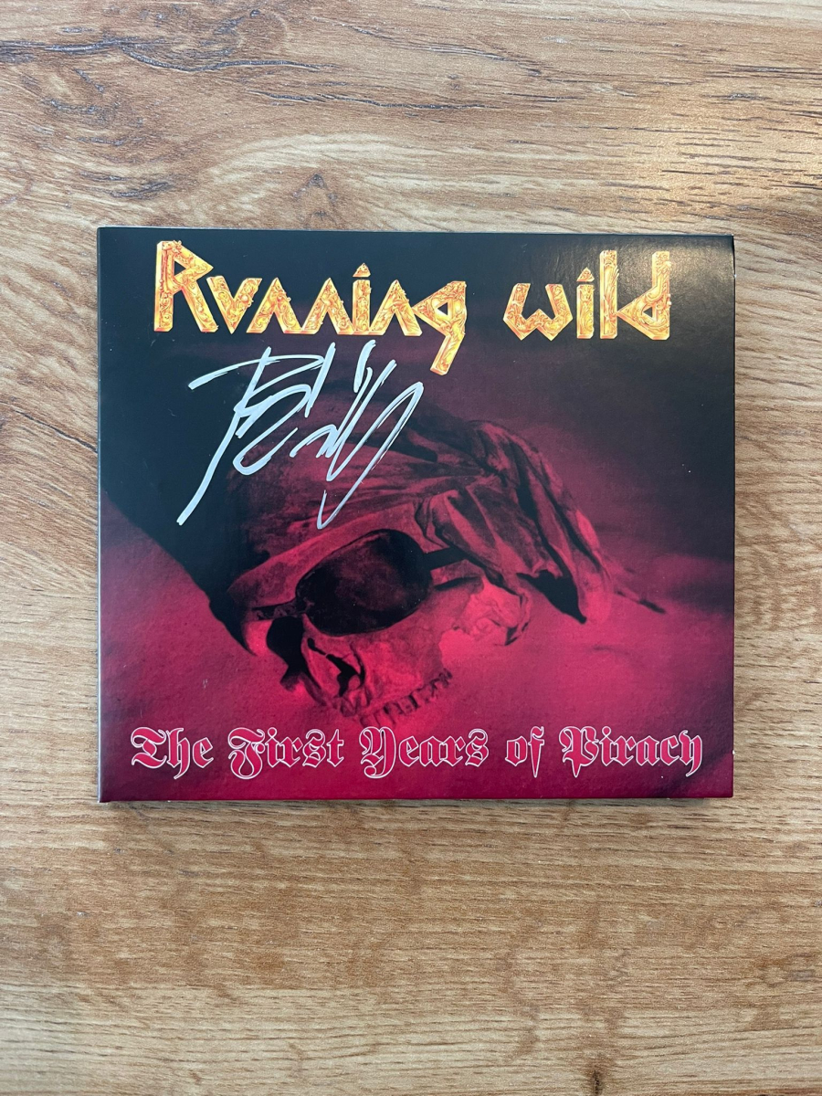 Running Wild CD The first years of Piracy - signed by Rock`n`Rolf